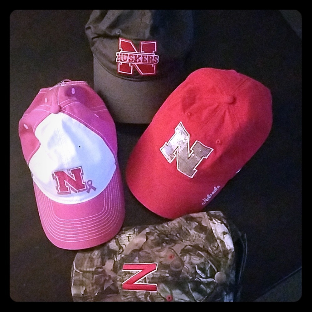 4 Husker ball caps